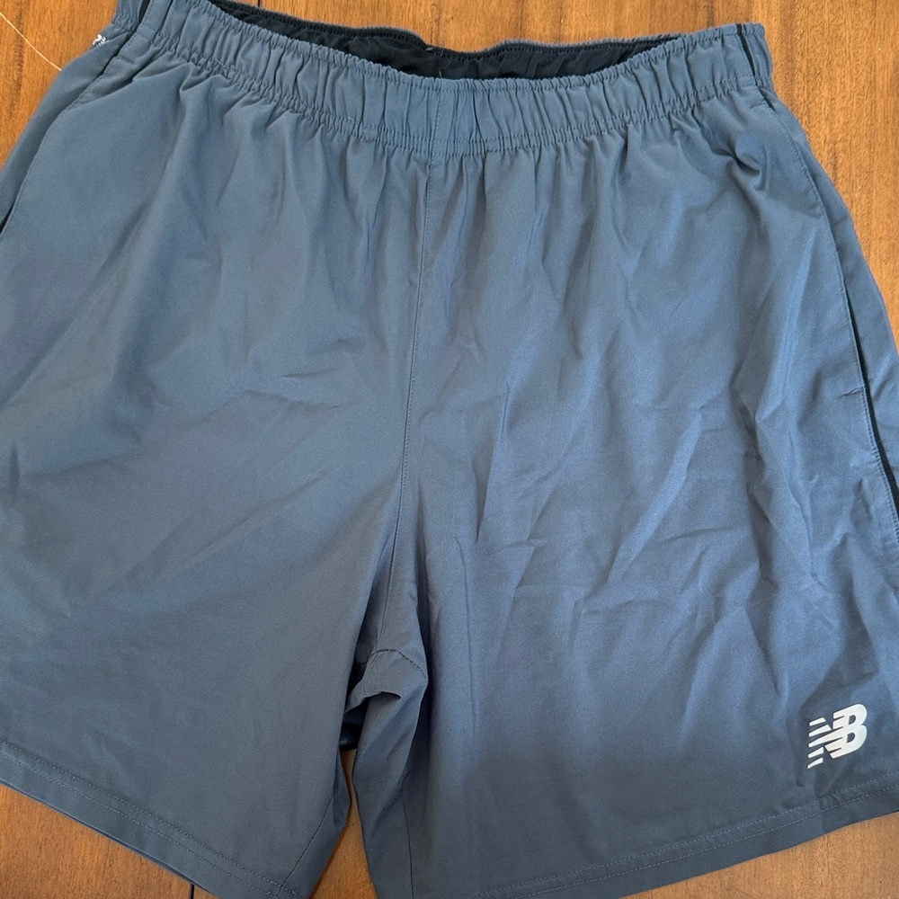 New Balance Men's Athletic Gray Shorts with Black Pinstripe Siding